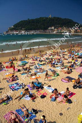 Beach scene at La Concha Bay in the city of Donostia-San Sebastian, Guipuzcoa, Basque Country, Northern Spain.