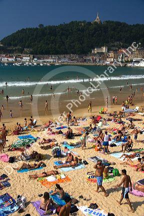 Beach scene at La Concha Bay in the city of Donostia-San Sebastian, Guipuzcoa, Basque Country, Northern Spain.