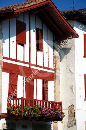 Basque architecture in the village of Ainhoa, Pyrenees-Atlantiques, French Basque Country, Southwest France.