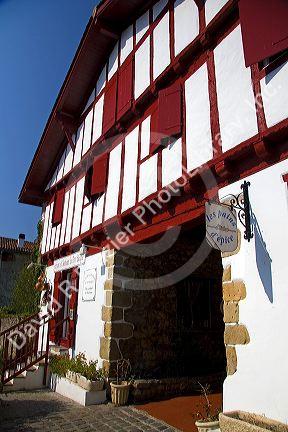 Basque architecture in the village of Ainhoa, Pyrenees-Atlantiques, French Basque Country, Southwest France.
