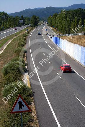 Automobiles travel along the A-10 Autopista near the town of Etxarri-Aranatz, Navarre, northern Spain.