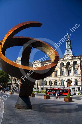 Public art sculpture Variante Ovoide de la Desocupacion de la Esfera by Jorge Oteiza in front of the City Hall of Bilbao, Biscay, Basque Country, northern Spain.