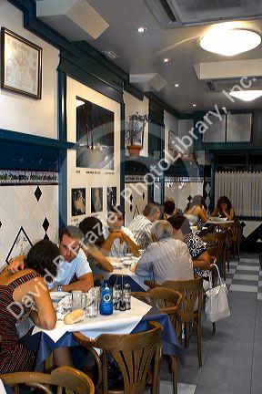 People dine at a restaurant in the city of Bilbao, Biscay, Basque Country, northern Spain.