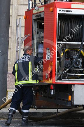 Firefighter and firetruck in the city of Bilbao, Biscay, northern Spain.