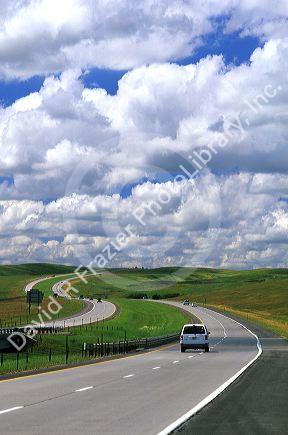 Automobiles travel on Interstate 90 through South Dakota.