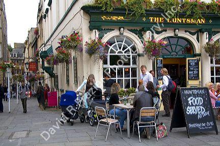 People dine outdoors at The Huntsman in Bath, Somerset, England.