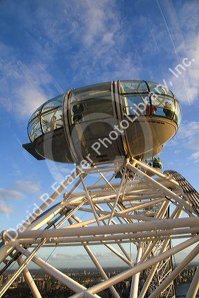 Tourists view the city of London from the London Eye, England.