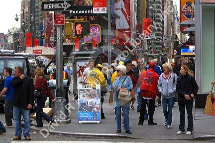 Pedestrians in Times Square, Manhattan, New York City, New York, USA.