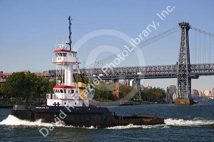 Tugboat on the East River in New York City, New York, USA.