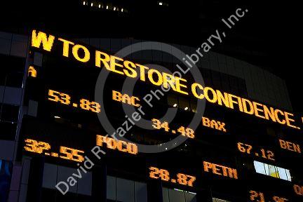 News and stock ticker in Times Square, Manhattan, New York City, New York, USA.