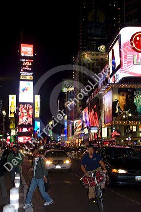 Times Square at night in Manhattan, New York City, New York, USA.