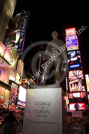 George M. Cohan Statue in Time Square at night, Manhattan, New York City, New York, USA.