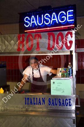 Hot dog vendor at the MBTA station in Cambridge, Greater Boston, Massachusetts, USA.