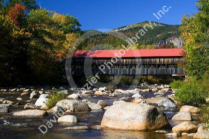 Covered bridge crossing the Swift River in the White Mountain National Forest at Albany, New Hampshire, USA.