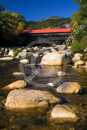 Covered bridge crossing the Swift River in the White Mountain National Forest at Albany, New Hampshire, USA.