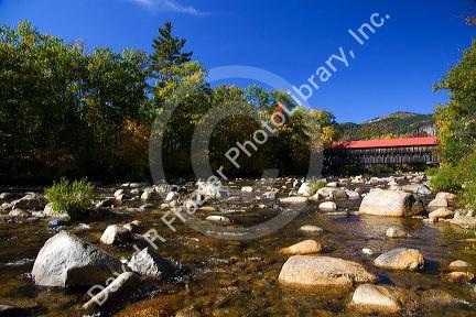 Covered bridge crossing the Swift River in the White Mountain National Forest at Albany, New Hampshire, USA.