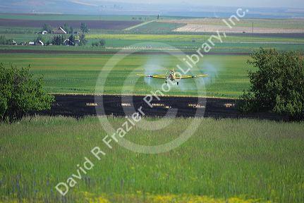 Cropduster spraying a field.