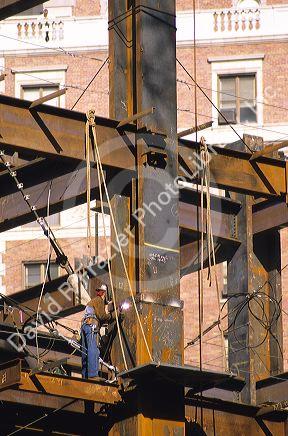 Steel worker, welder works on the construction of a new building in Los Angeles, California.