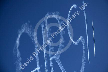 Small airplane sky writing over Boise, Idaho, USA.