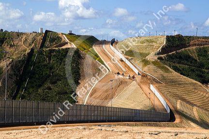Construction of the border fence that prevents illegal immagrant crossings at the U.S./Mexico border near San Diego, California.