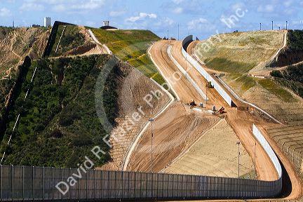Construction of the border fence that prevents illegal immagrant crossings at the U.S./Mexico border near San Diego, California