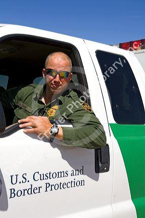 United States Border Patrol agent at the U.S./Mexico border along the All American Canal near Calexico, California