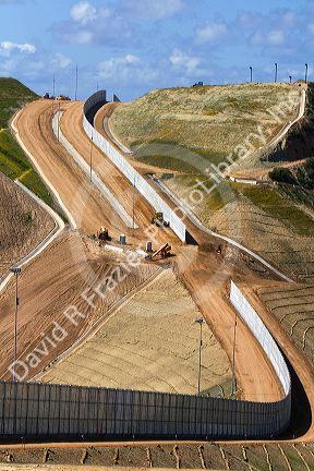 Construction of the border fence that prevents illegal immagrant crossings at the U.S./Mexico border near San Diego, California