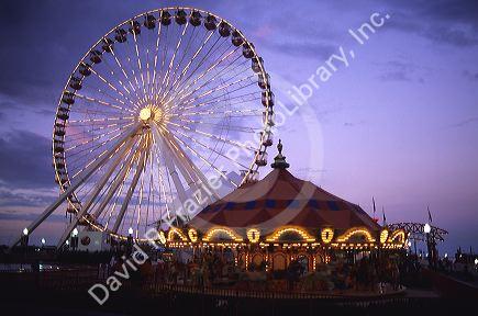 A ferris wheel and carousel at the Navy Pier in Chicago, Illinois.