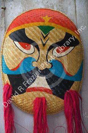 Painted ceremonial masks being sold for Tet in Hanoi, Vietnam.