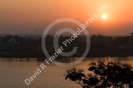Sunrise over the Saigon River in Ho Chi Minh City, Vietnam.