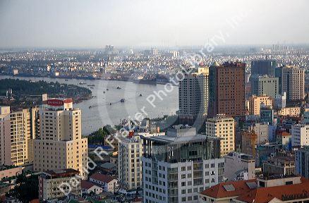 Cityscape view of Ho Chi Minh City and the Saigon River from atop the Saigon Trade Center skyscraper, Vietnam.