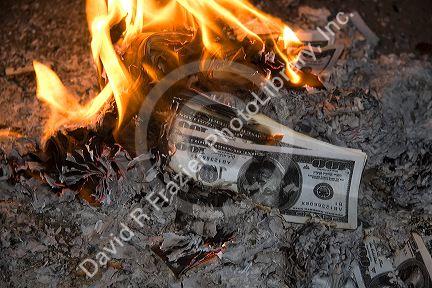Vietnamese people burn photocopied U.S. dollars for good luck and prosperity in the coming year during Tet festivities in Hanoi, Vietnam.