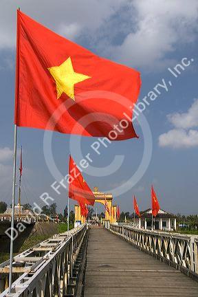 Memorial portal to Ho Chi Minh at the Hien Luong Bridge spanning the Ben Hai River in Quang Tri Province, Vietnam.