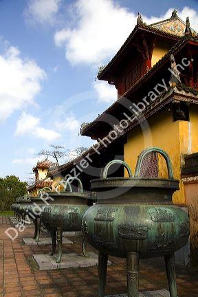 The Nine Dynastic Urns in front of the Mieu Temple within the Imperial Citadel of Hue, Vietnam.
