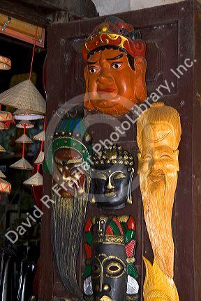Painted ceremonial masks being sold for Tet in Hanoi, Vietnam.
