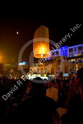 Vietnamese people celebrate Tet by releasing Sky Lanterns in Hanoi, Vietnam.