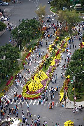 View of Hguyen Hue with flower displays in celebration of Tet Lunar New Year in Ho Chi Minh City, Vietnam.