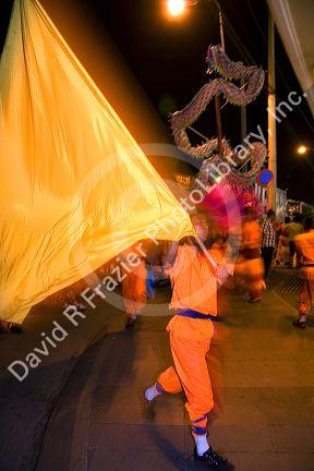 Dragon dance performance during Tet Lunar New Year celebrations in Ho Chi Minh City, Vietnam.