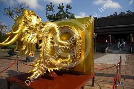 Gold leaf dragon sculpture on display at the Imperial Citadel of Hue, Vietnam.