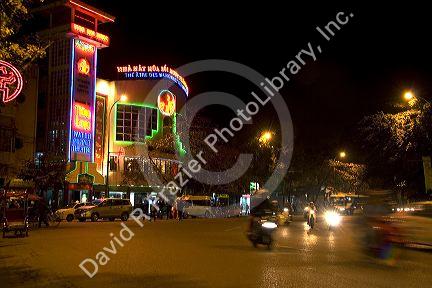 Thang Long Water Puppet Theate at night with neon signage in Hanoi, Vietnam.