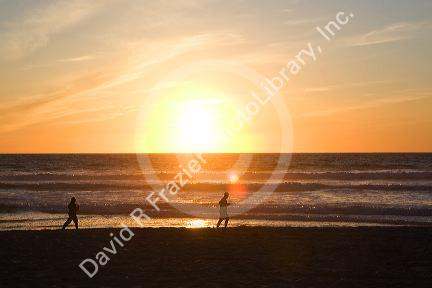 Sunset over the Pacific Ocean at Mission Beach in San Diego, Southern California, USA.