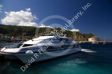 Jet engine catamaran ferry boat docked at the town of Avalon on Catalina Island, California, USA.