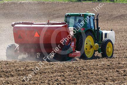 Farmer planting potato crop in Canyon County, Idaho, USA.