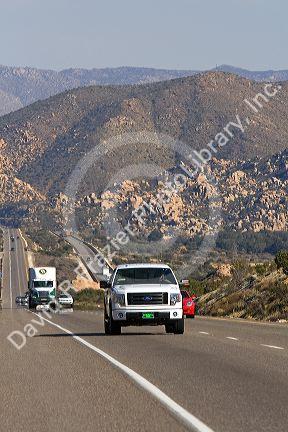 Automobiles traveling on Interstate 8 between El Centro and San Diego, Southern California, USA.