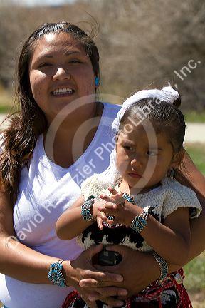 Portrait of a young Navajo Indian girl and her mother from Arizona, USA. MR