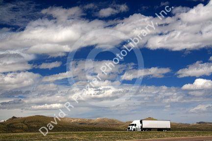 Long haul truck traveling on Interstate 80 in Carbon County, Wyoming, USA.