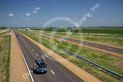 Automobile traveling on Interstate 70 in Russell County, Kansas, USA.