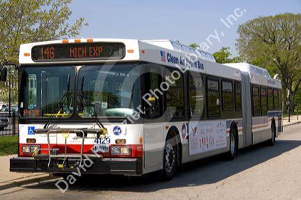 Diesel-electric hybrid public city bus in Chicago, Illinois, USA.