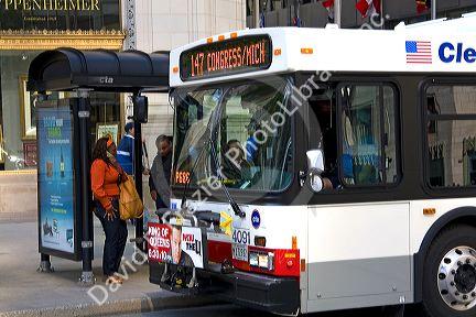 Diesel-electric hybrid public city bus in Chicago, Illinois, USA.