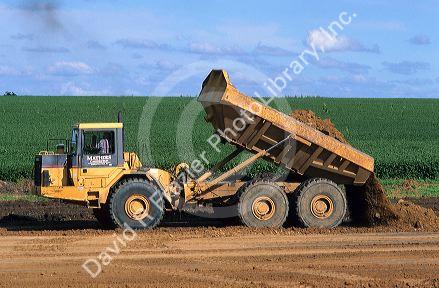 Construction dump truck at road construction along state highway 60 in Northwest Iowa.